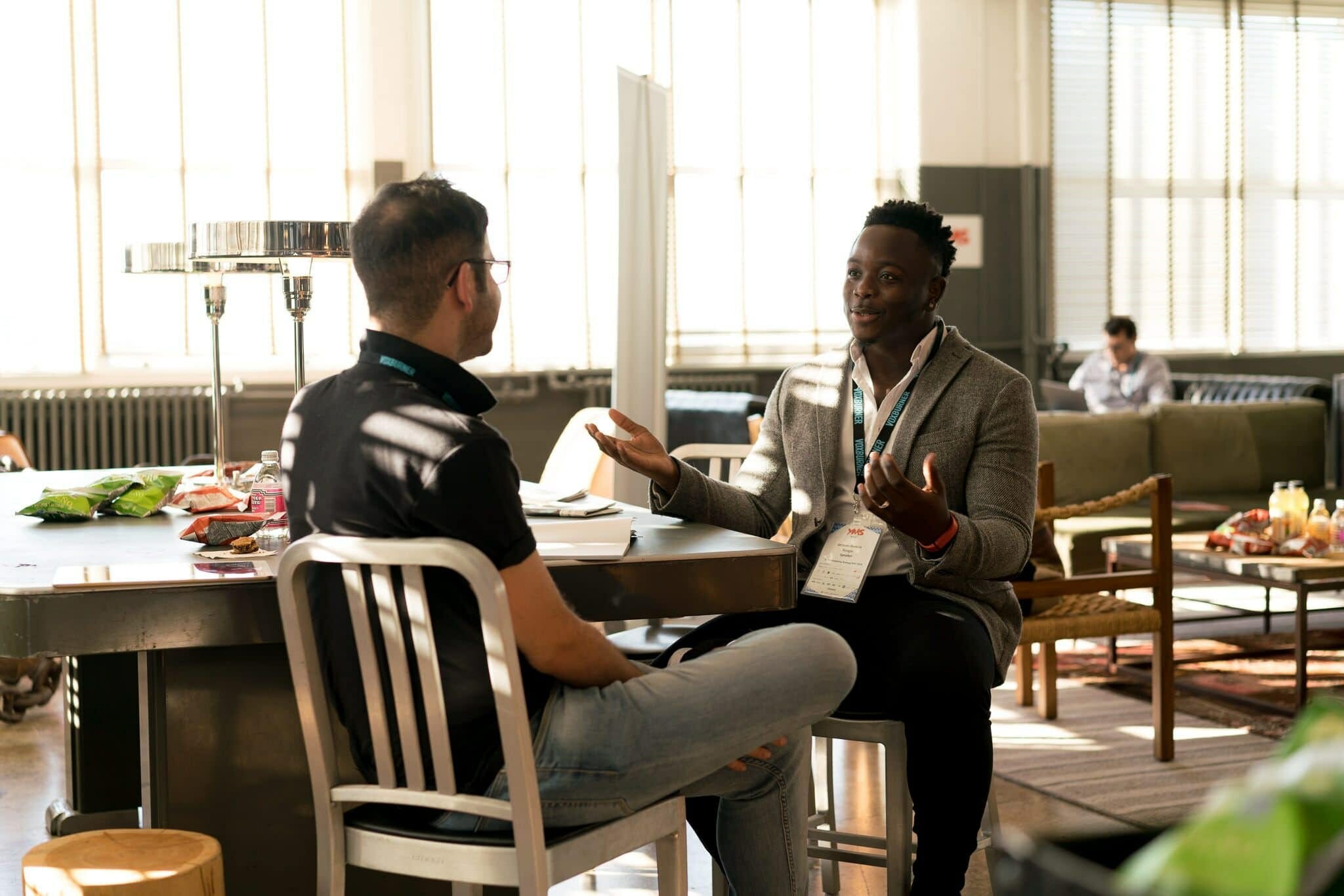 photo-of-men-having-conversation